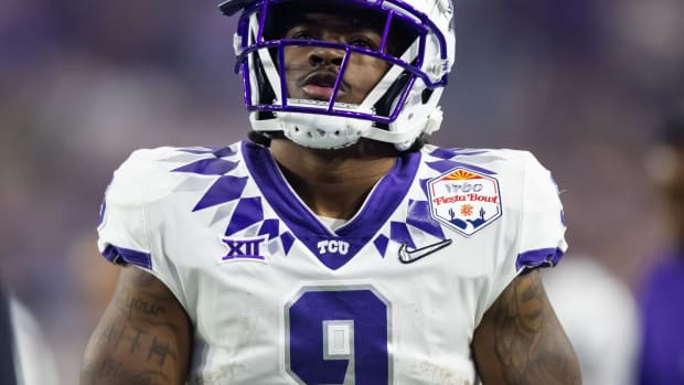 TCU Horned Frogs running back Emani Bailey (9) against the Michigan Wolverines during the 2022 Fiesta Bowl at State Farm Stadium.